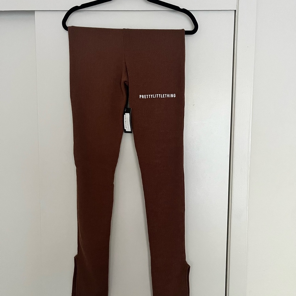 Ribbed pants from PrettyLittleThing.Pants have split on the side at the bottom.
